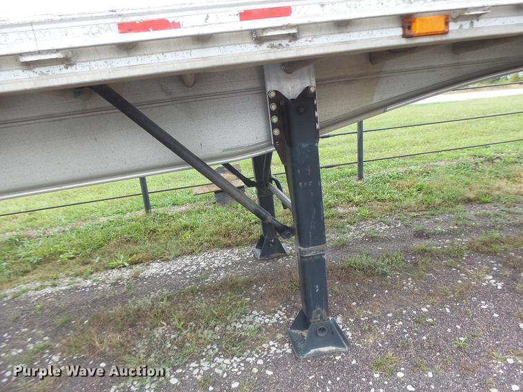 image for item DB9997 1990 East flatbed trailer