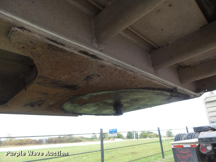 image for item DB9997 1990 East flatbed trailer