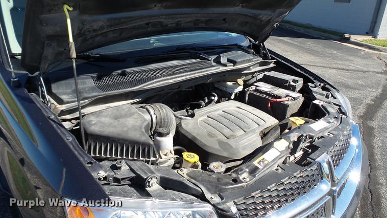 image for item DC1000 2013 Dodge Grand Caravan van