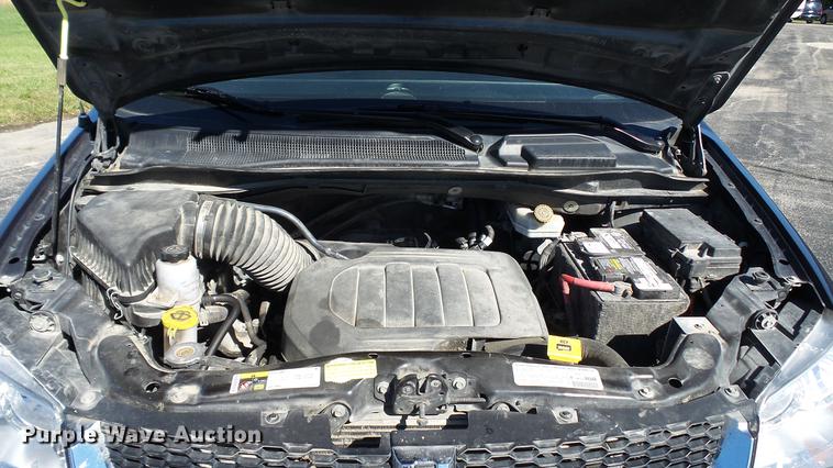 image for item DC1000 2013 Dodge Grand Caravan van