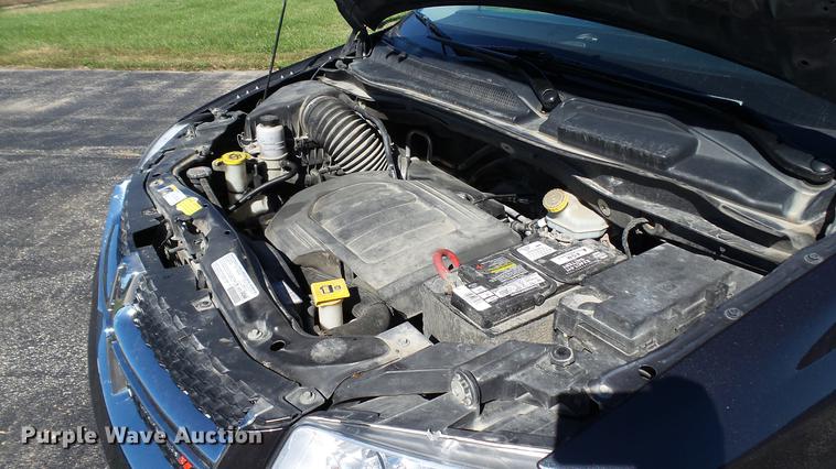 image for item DC1000 2013 Dodge Grand Caravan van