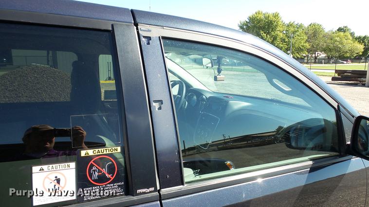 image for item DC1000 2013 Dodge Grand Caravan van