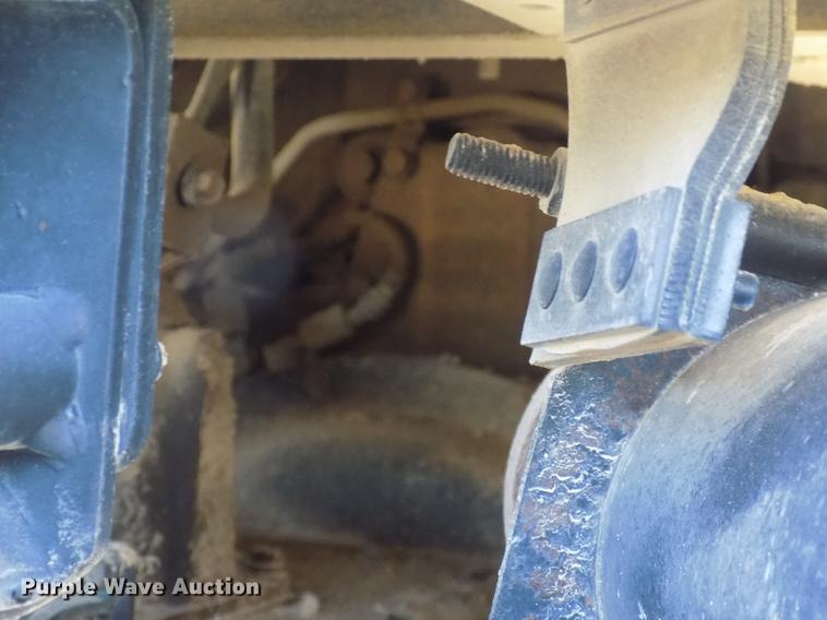 image for item DC4792 2004 Sterling LT9513 roll off truck