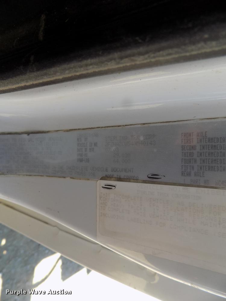 image for item DC4792 2004 Sterling LT9513 roll off truck