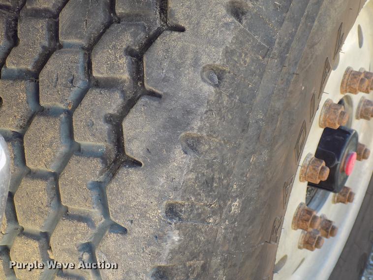 image for item DC4792 2004 Sterling LT9513 roll off truck