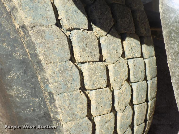 image for item DC4792 2004 Sterling LT9513 roll off truck