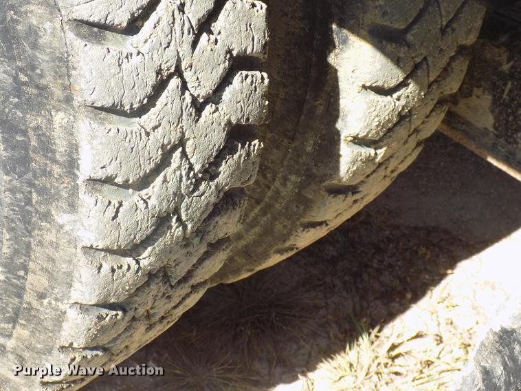 image for item DC4792 2004 Sterling LT9513 roll off truck