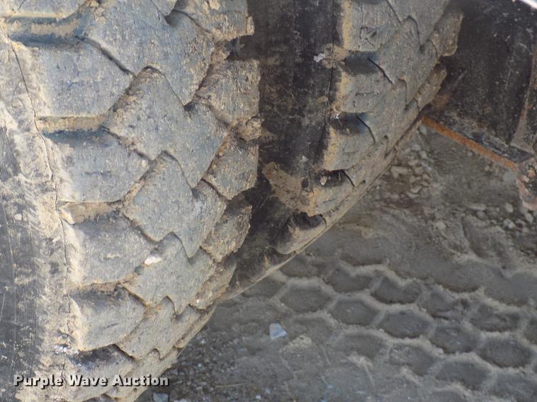 image for item DC4792 2004 Sterling LT9513 roll off truck