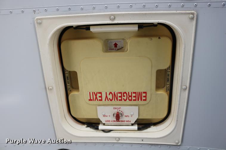 image for item DD0036 2000 Blue Bird TC2000 bus