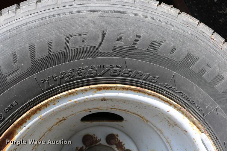 image for item DD0107 2002 Ford F350 Super Duty dump bed pickup truck