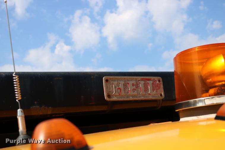 image for item DD0107 2002 Ford F350 Super Duty dump bed pickup truck