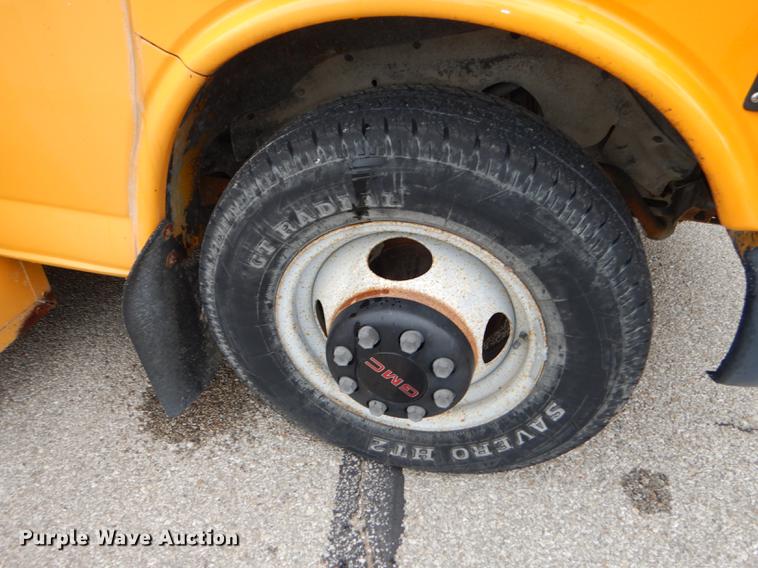 image for item DD0827 2002 GMC Savana G3500 Cargo Thomas school bus