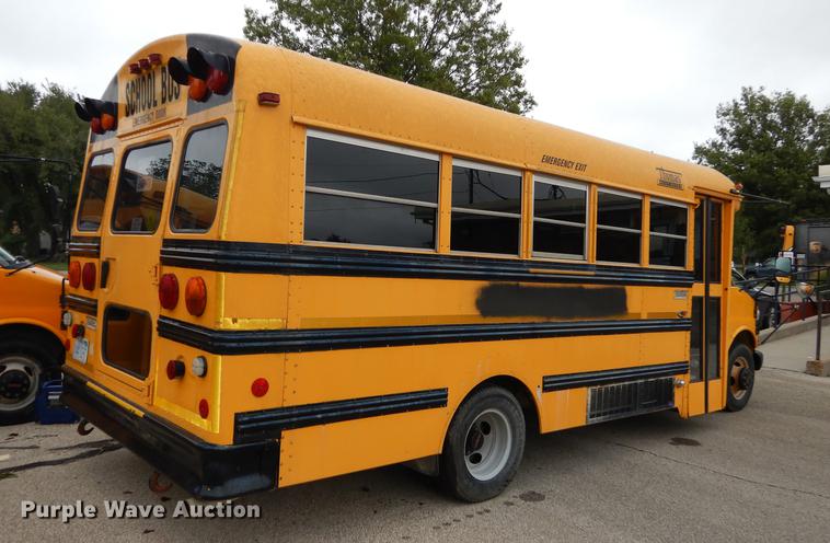 image for item DD0829 2002 GMC Savana G3500 Cargo Thomas school bus