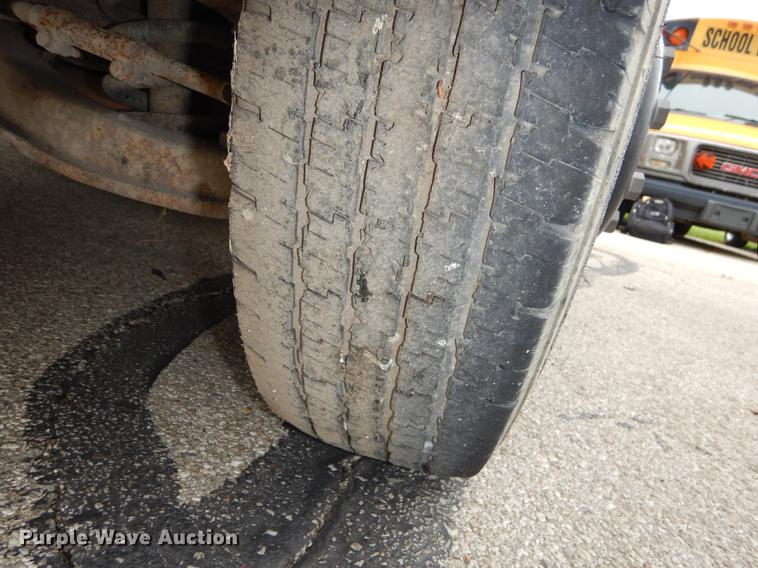 image for item DD0829 2002 GMC Savana G3500 Cargo Thomas school bus