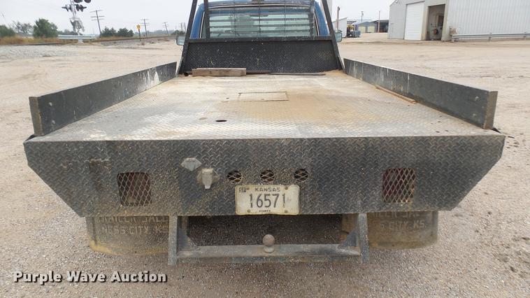 image for item DW9077 1985 Ford F350 flatbed pickup truck