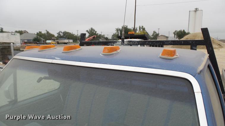 image for item DW9077 1985 Ford F350 flatbed pickup truck