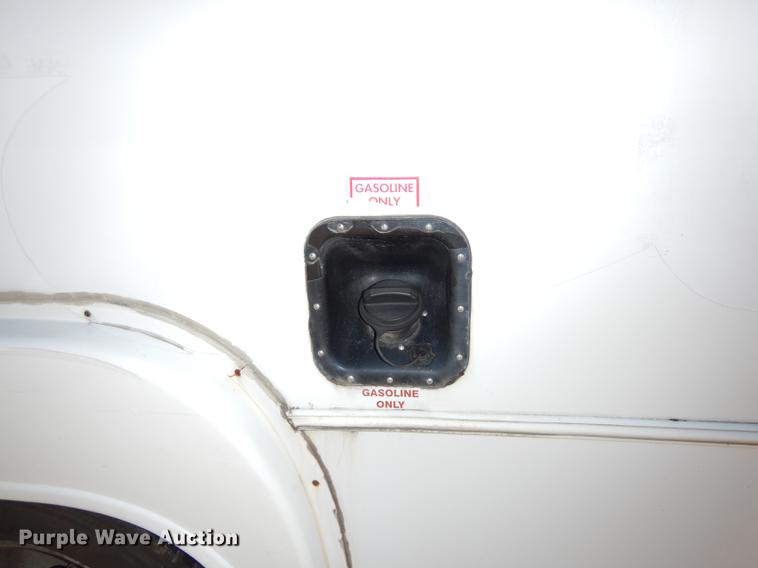 image for item J5669 2006 Ford Econoline E450 Super Duty Goshen Coach shuttle bus