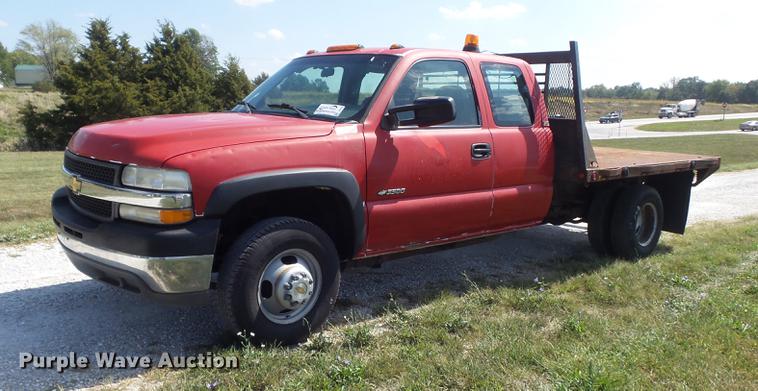 image for item DB6398 2001 Chevrolet Silverado 3500 Ext. Cab flatbed pickup truck
