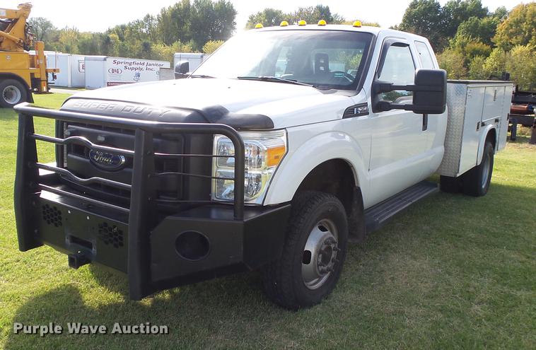 image for item DB7375 2013 Ford F350 Super Duty SuperCab utility bed pickup truck