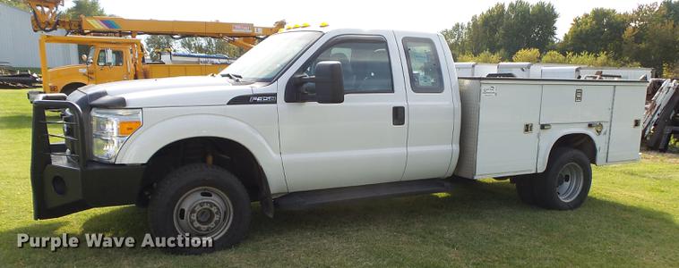 image for item DB7375 2013 Ford F350 Super Duty SuperCab utility bed pickup truck