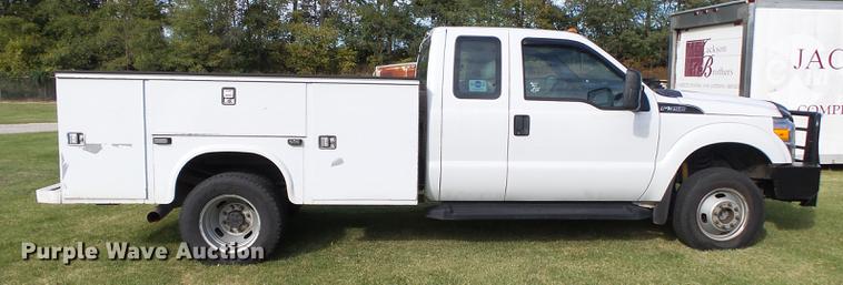 image for item DB7375 2013 Ford F350 Super Duty SuperCab utility bed pickup truck