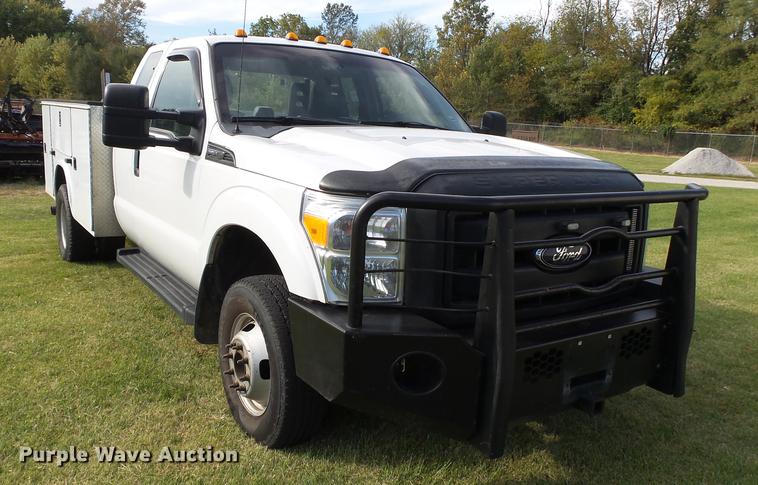 image for item DB7375 2013 Ford F350 Super Duty SuperCab utility bed pickup truck