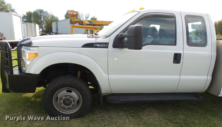 image for item DB7375 2013 Ford F350 Super Duty SuperCab utility bed pickup truck