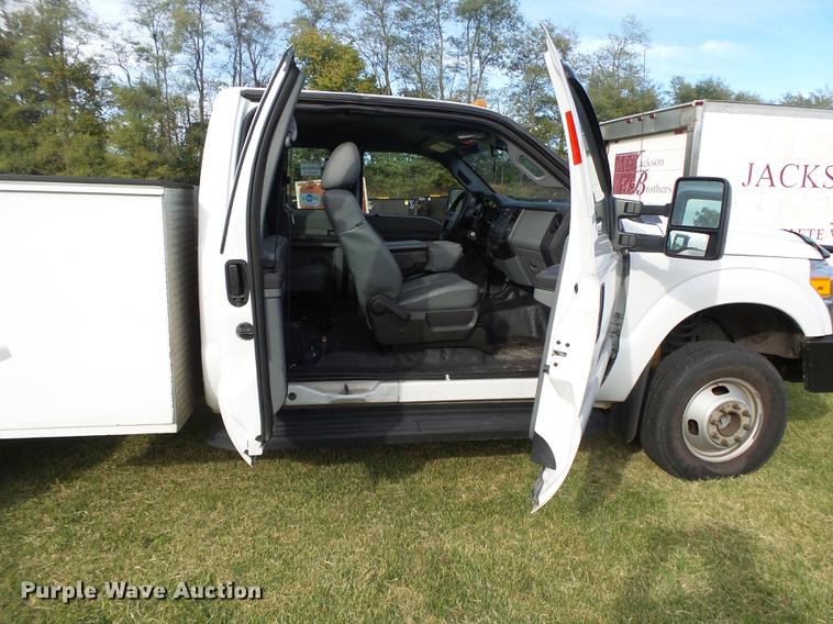 image for item DB7375 2013 Ford F350 Super Duty SuperCab utility bed pickup truck