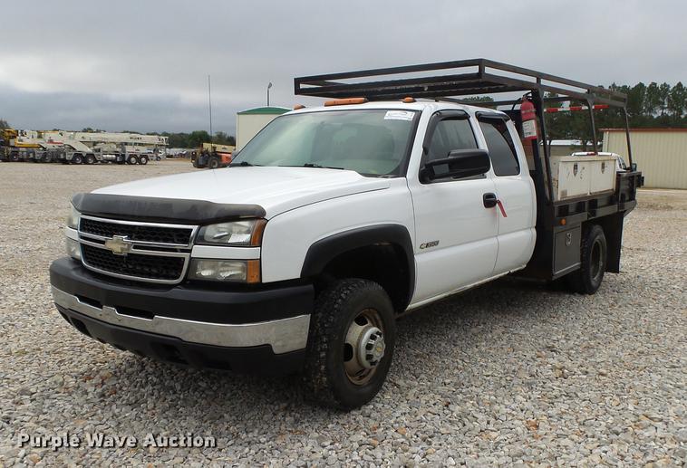 image for item DB7381 2006 Chevrolet Silverado 3500 Ext. Cab flatbed pickup truck