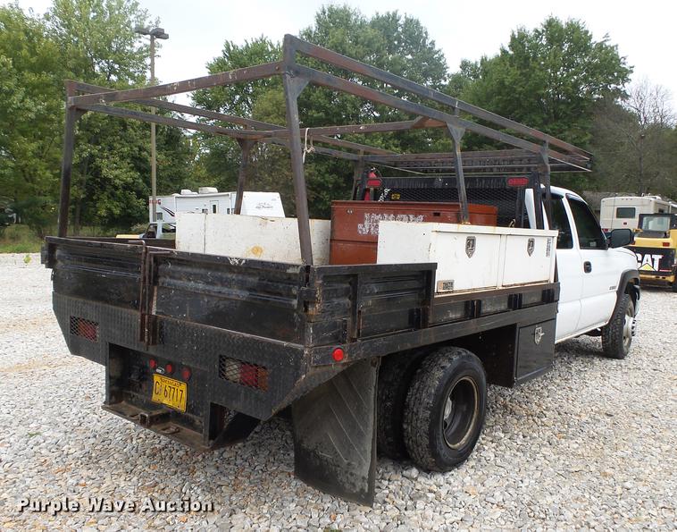 image for item DB7381 2006 Chevrolet Silverado 3500 Ext. Cab flatbed pickup truck