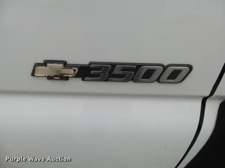 image for item DB7381 2006 Chevrolet Silverado 3500 Ext. Cab flatbed pickup truck