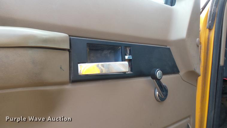 image for item DC1797 1997 GMC C7500 flat dump bed truck