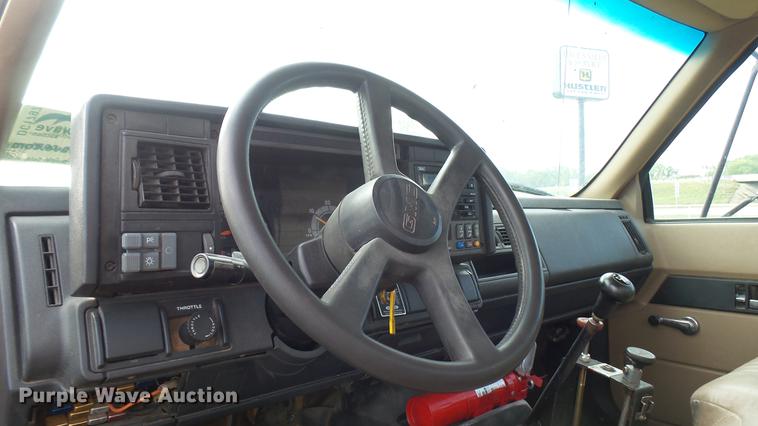 image for item DC1797 1997 GMC C7500 flat dump bed truck