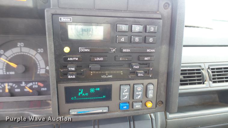 image for item DC1797 1997 GMC C7500 flat dump bed truck