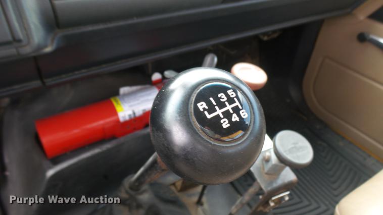 image for item DC1797 1997 GMC C7500 flat dump bed truck