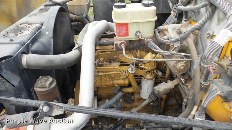 image for item DC1797 1997 GMC C7500 flat dump bed truck