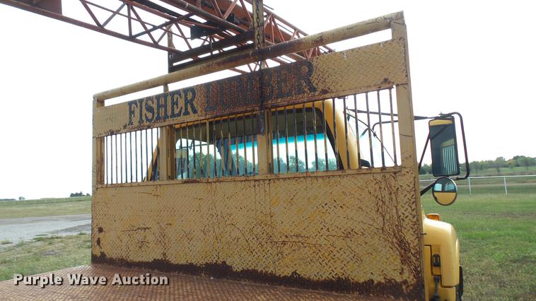 image for item DC1797 1997 GMC C7500 flat dump bed truck