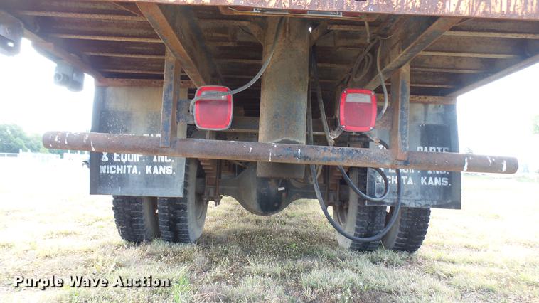 image for item DC1797 1997 GMC C7500 flat dump bed truck