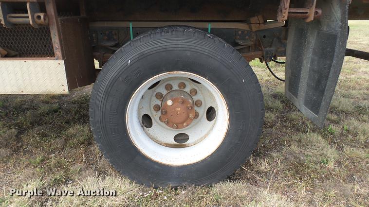 image for item DC1797 1997 GMC C7500 flat dump bed truck