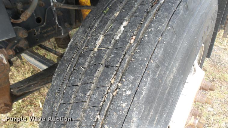 image for item DC1797 1997 GMC C7500 flat dump bed truck