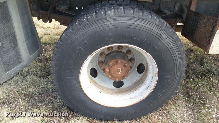 image for item DC1797 1997 GMC C7500 flat dump bed truck