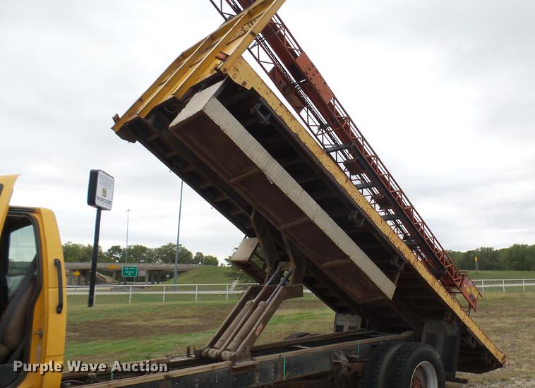 image for item DC1797 1997 GMC C7500 flat dump bed truck