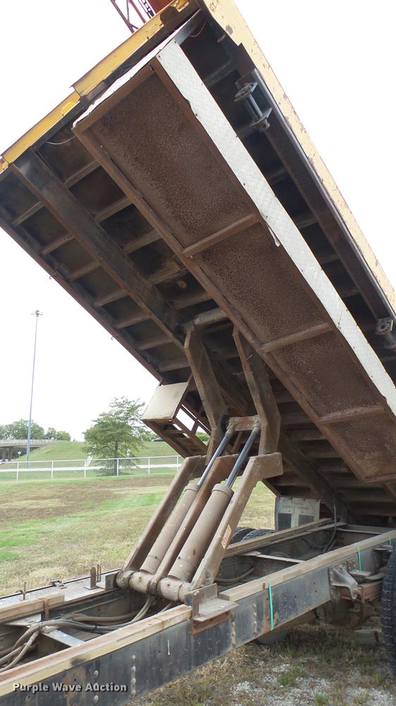 image for item DC1797 1997 GMC C7500 flat dump bed truck