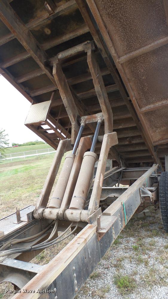 image for item DC1797 1997 GMC C7500 flat dump bed truck