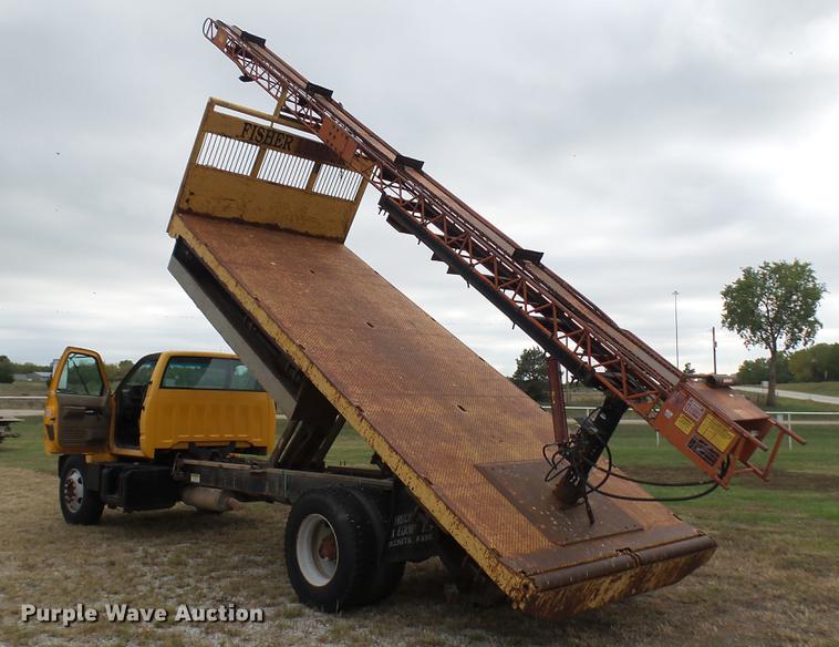 image for item DC1797 1997 GMC C7500 flat dump bed truck