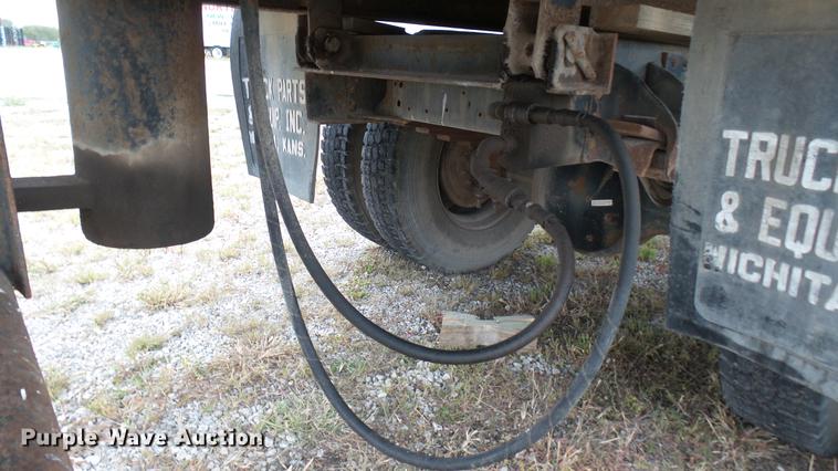 image for item DC1797 1997 GMC C7500 flat dump bed truck