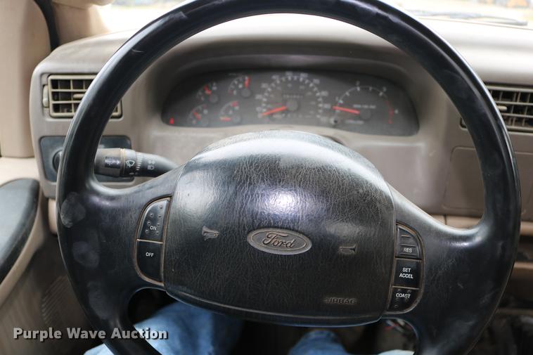 image for item DD0033 1999 Ford F450 Super Duty dump truck