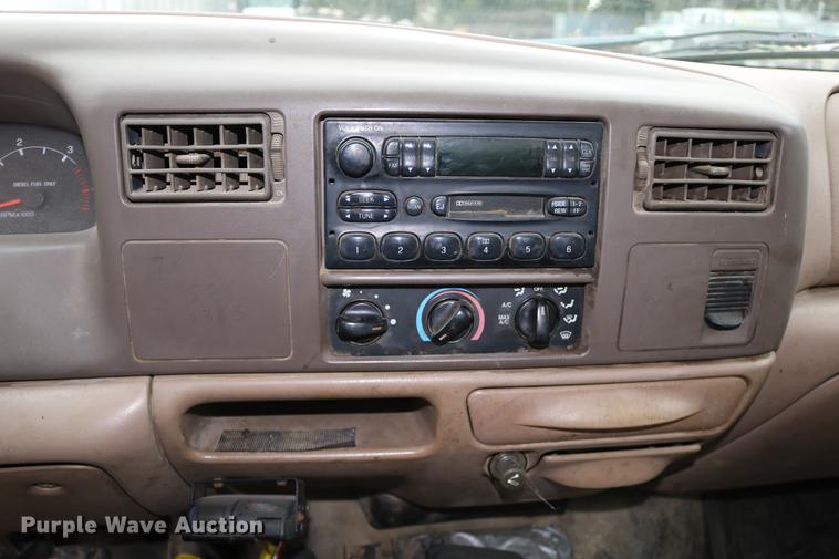 image for item DD0033 1999 Ford F450 Super Duty dump truck