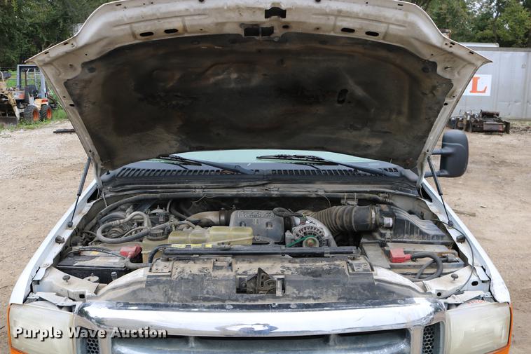 image for item DD0033 1999 Ford F450 Super Duty dump truck