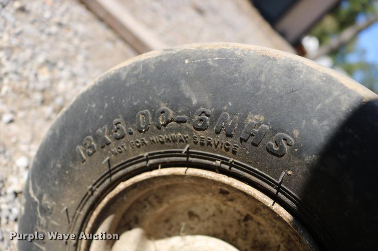 image for item DW9979 John Deere 657A lawn mower